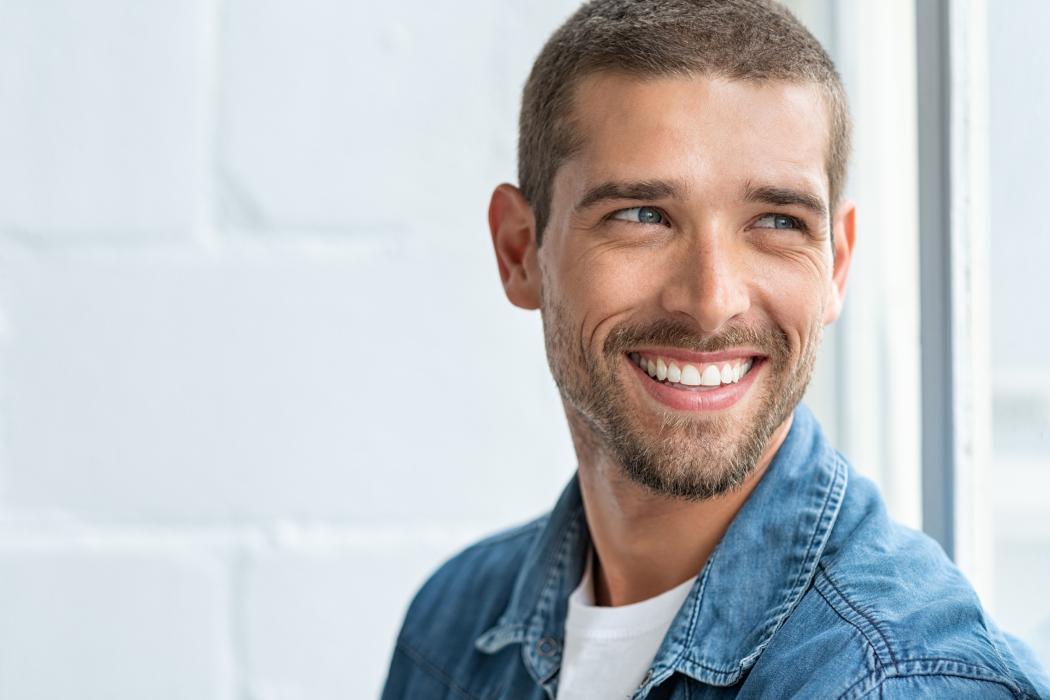 smiling man with white teeth