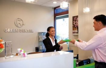Front desk greeting a patient